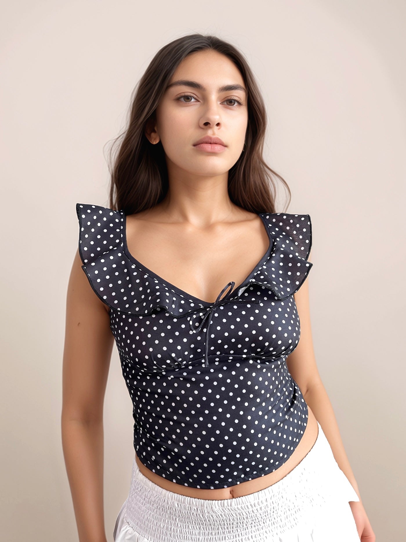 Mira Polka Dot Flounce Neck Top In Black